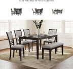 Cherry brown transitional table set with upholstered dining chairs and matching bench, seats 6.