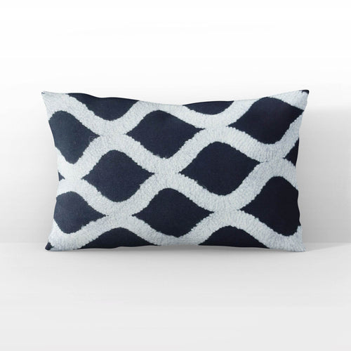 Black and white throw pillow Dark Jewels luxury pattern on modern sofa setting.
