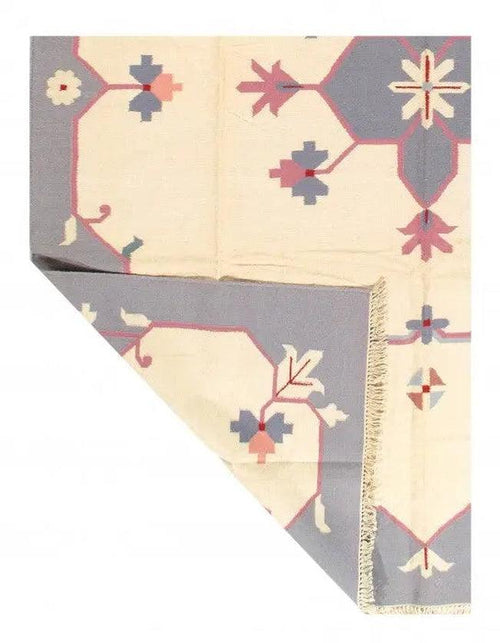 9x12 ivory rug Canvello Durrie hand woven cotton flat weave in bohemian tribal design.