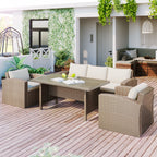 Outdoor conversation set for patio featuring ergonomic rattan sofa and beige cushioned seating.