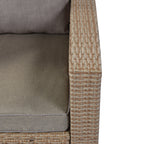  Outdoor conversation set 4-piece rattan sofa with beige cushions on patio deck.